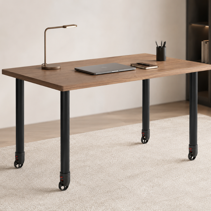 Wooden desk with Hafele black metal legs with casters in a minimalistic office setting